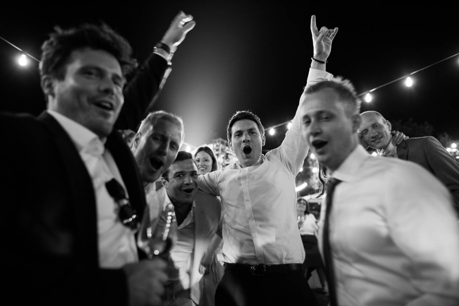 wedding guests having a lot of fun and enjoying the party