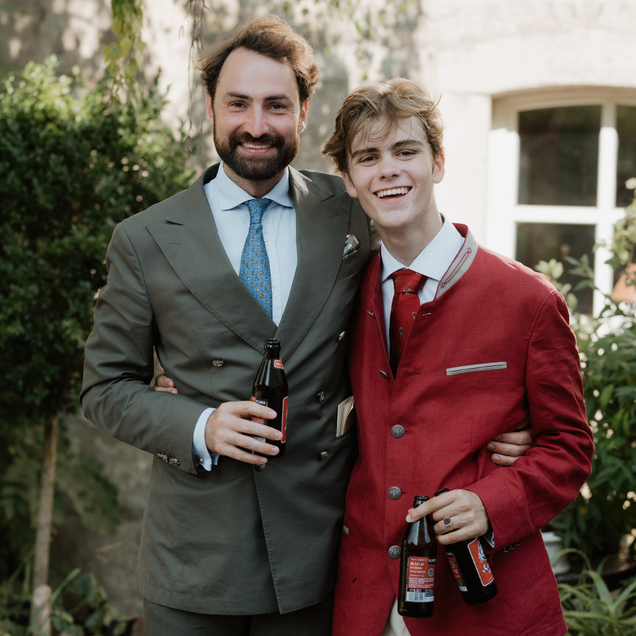 wedding guest with his grown up son