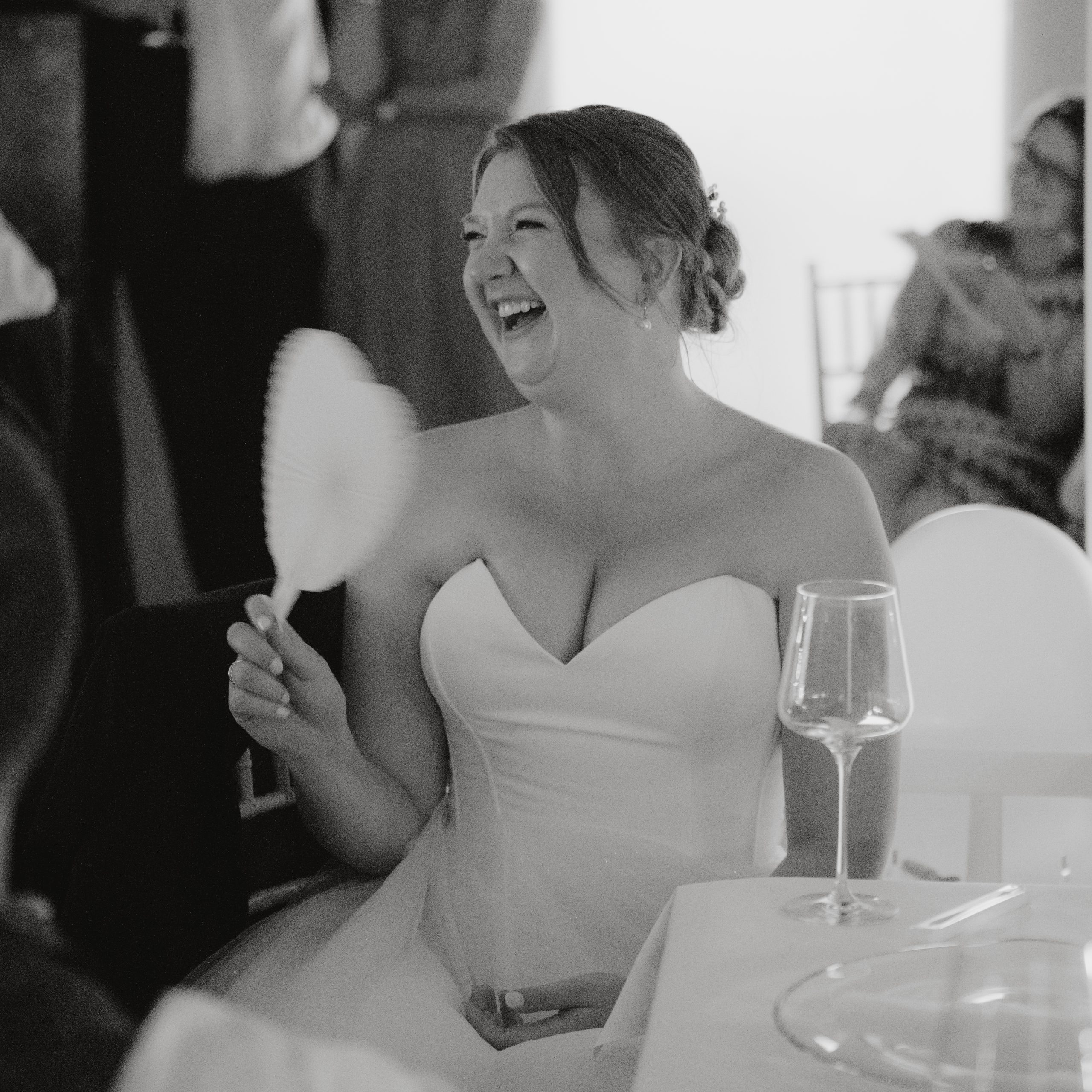 Laughing Bride listening to speech